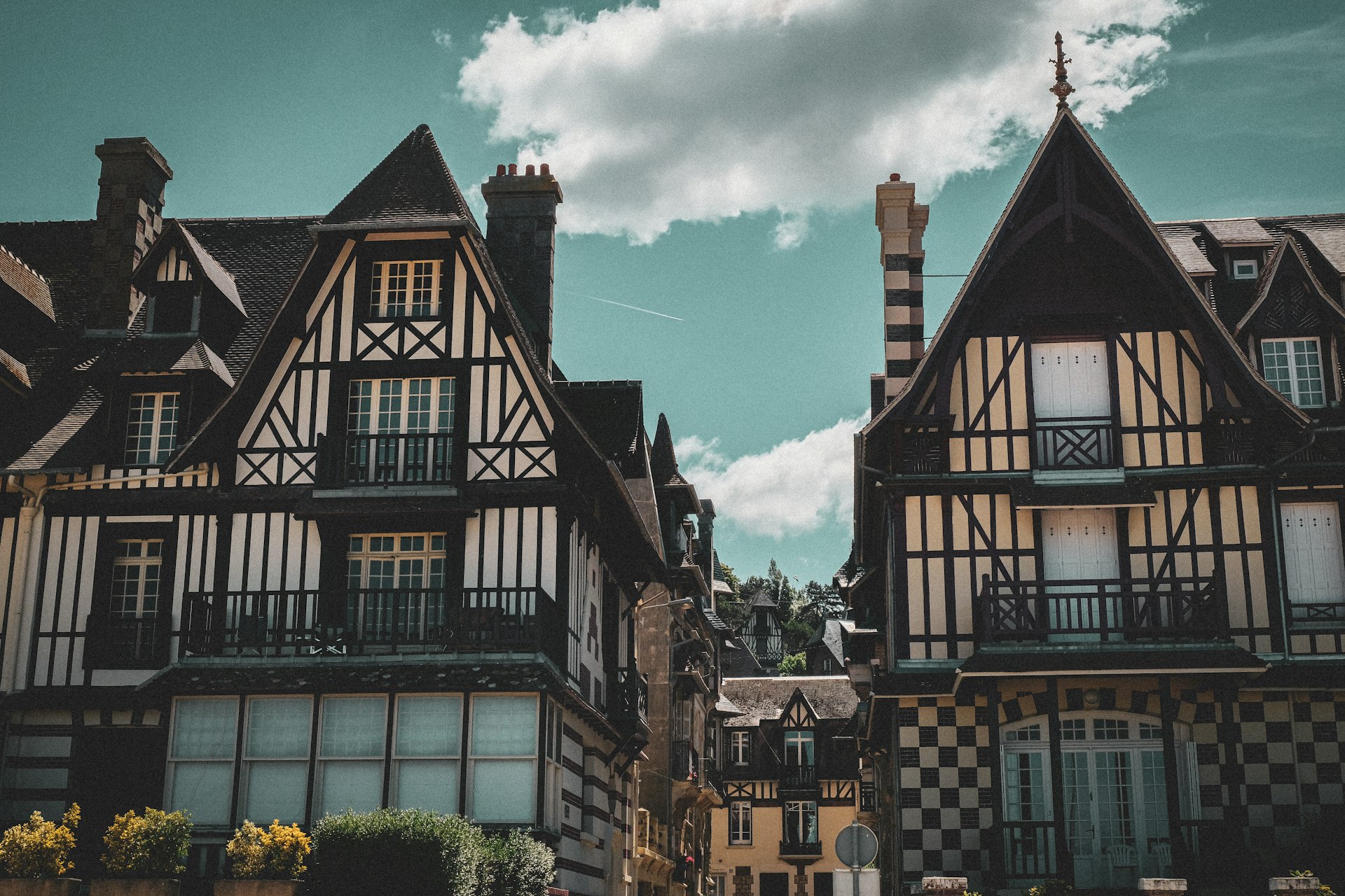 a group of buildings with a sky background